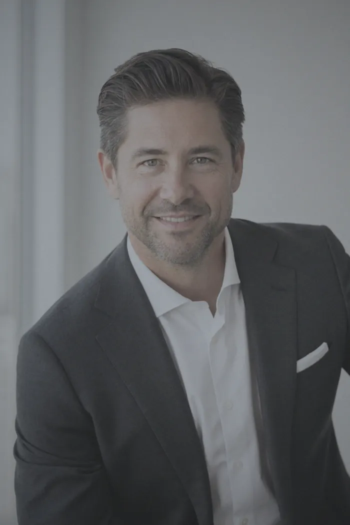 Executive headshot before enhancement